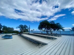 Solar panels on the roof of the Little Ship Club for sustainable energy and cost reduction